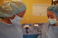 Drs. Wells and Carr in surgery