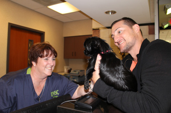 Daryn greets incoming patient and client